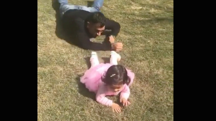 Dhoni PLAYING With Daughter Ziva