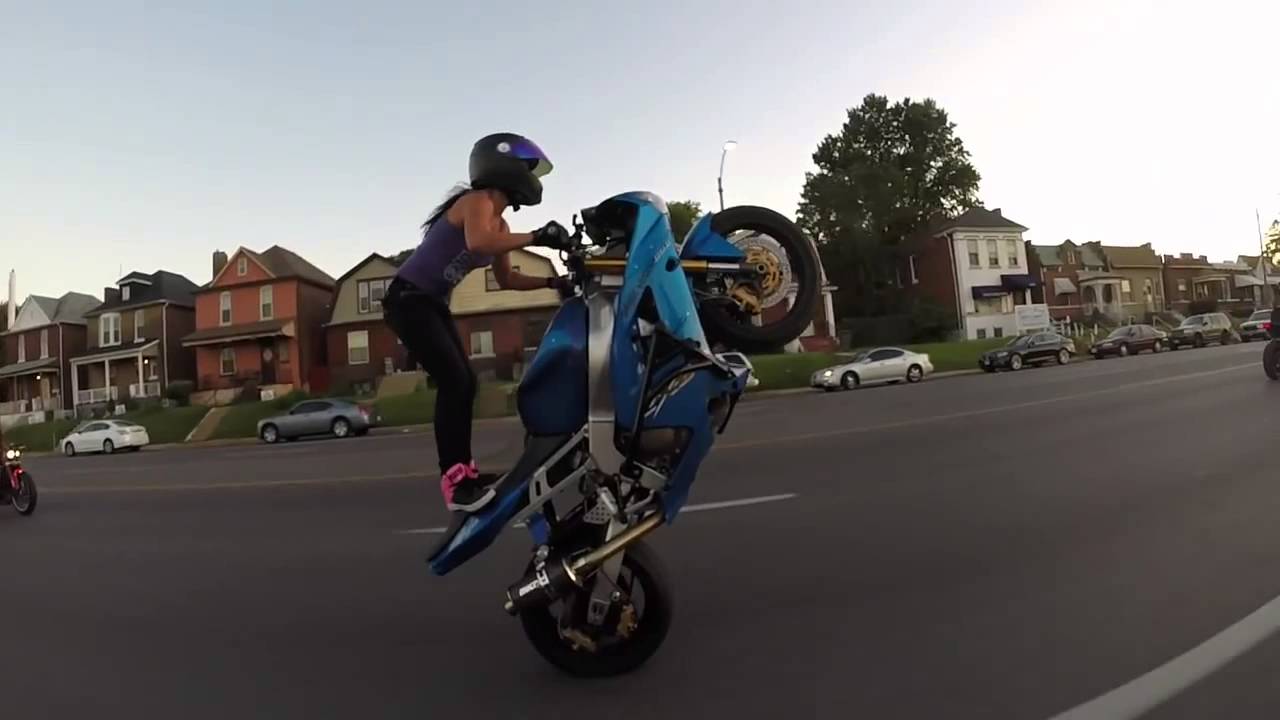video of bike stunt by girl