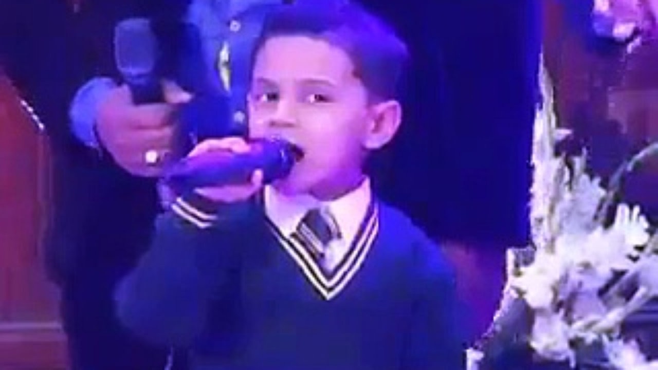 Small boy singing a song for his dad baba mere baba