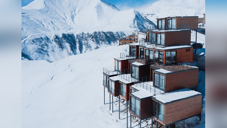 Quadrum ski and yoga resort made entirely from old shipping 