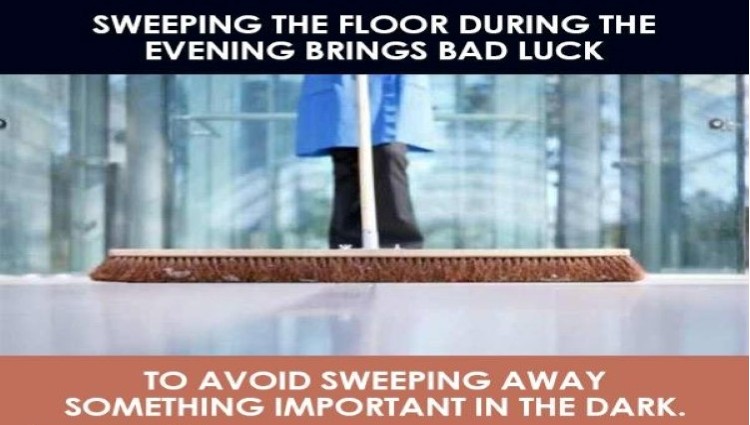 sweeping the floor in evening 