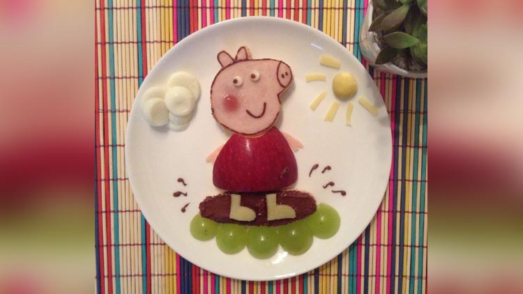 A Pig Made Up Of Apple And Grapes