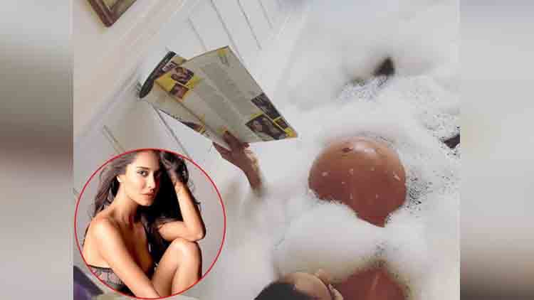 lisa haydon in bathtub with baby bump