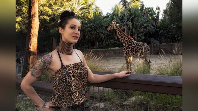 Giraffe woman gives up on her quest to have a long neck