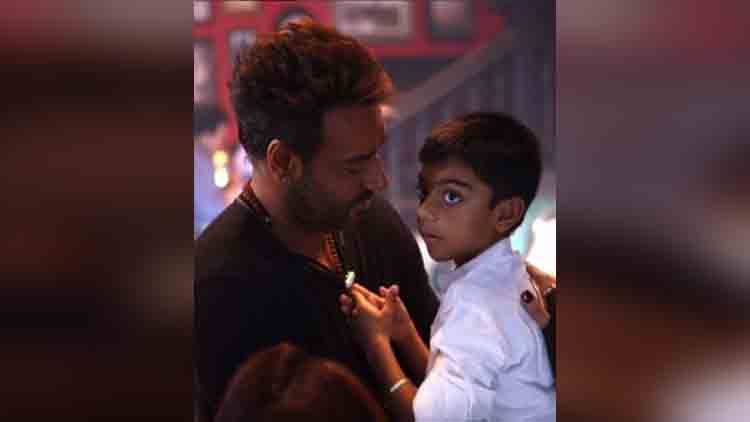 ajay devgns photo with his son yug