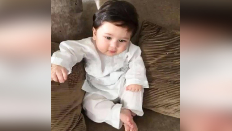 baby boy taimur ali khan looks every inch a nawab posing in a white kurta