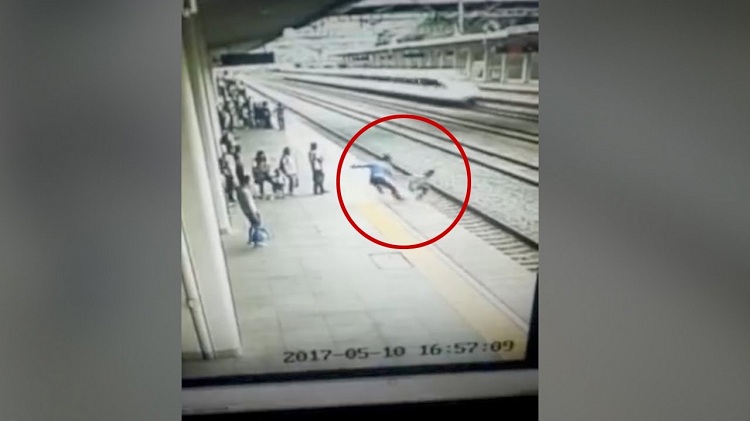 Footage Student saved from onrushing high-speed train