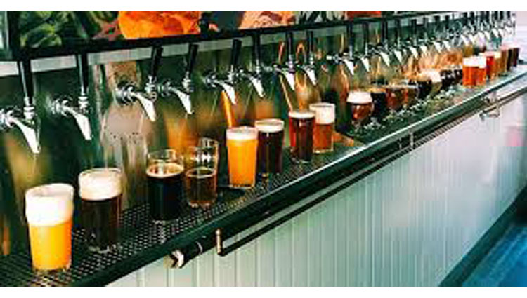 brooklyn bar turns wall of taps into beer atm 