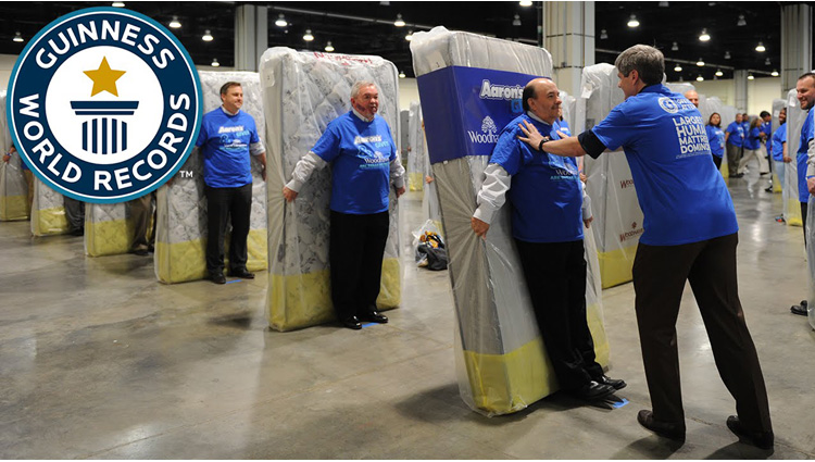 largest human mattress dominoes - guinness world records
