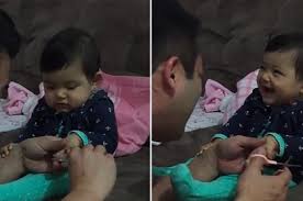 cut baby with her father