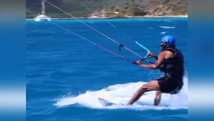 carefree obama kitesurfs in the caribbean