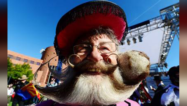 participants click pictures after World Beard and Moustache Championships