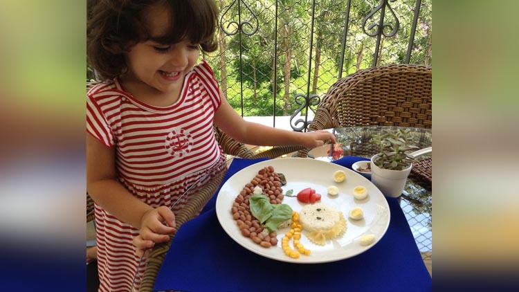 Caterina Eating The Dish