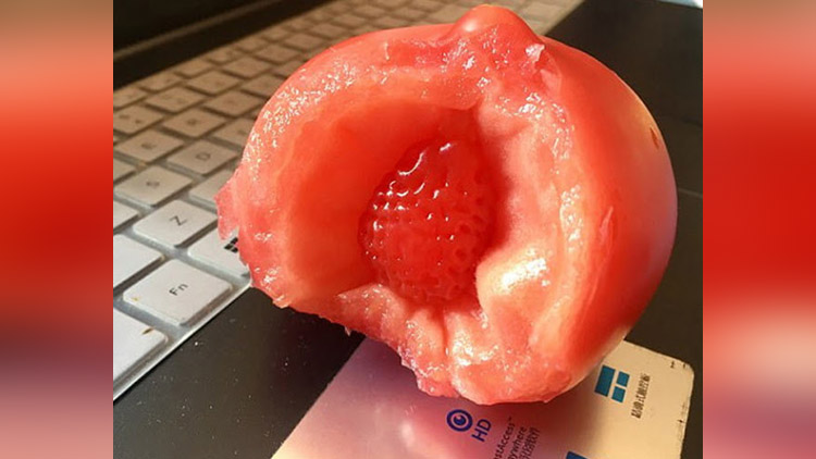 Man shocked to find a strawberry inside his tomato