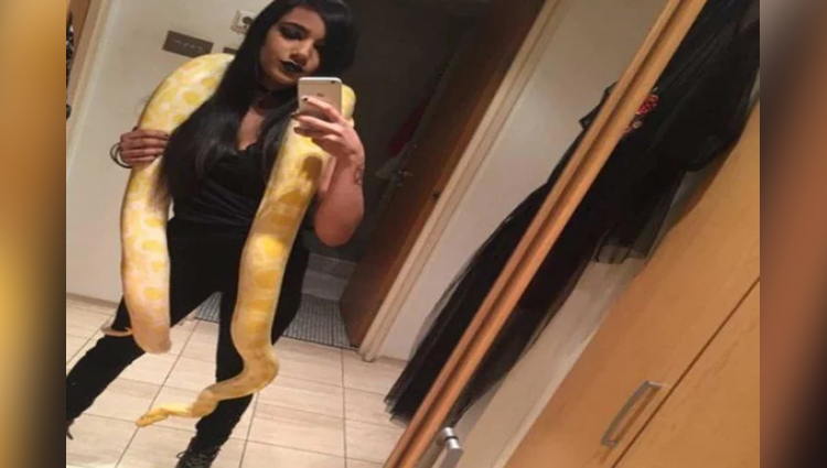 girl have collection of snake and python 