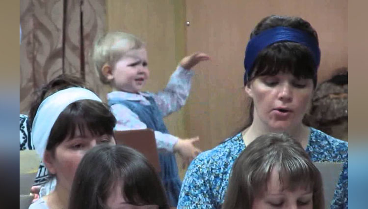 a small baby doing same as musician viral video