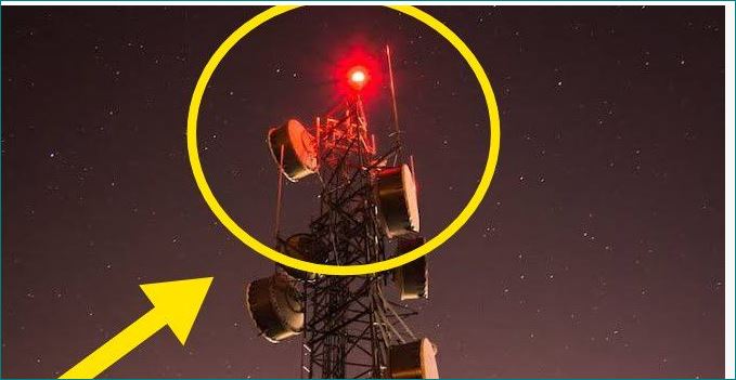 Why red light on mobile tower and building