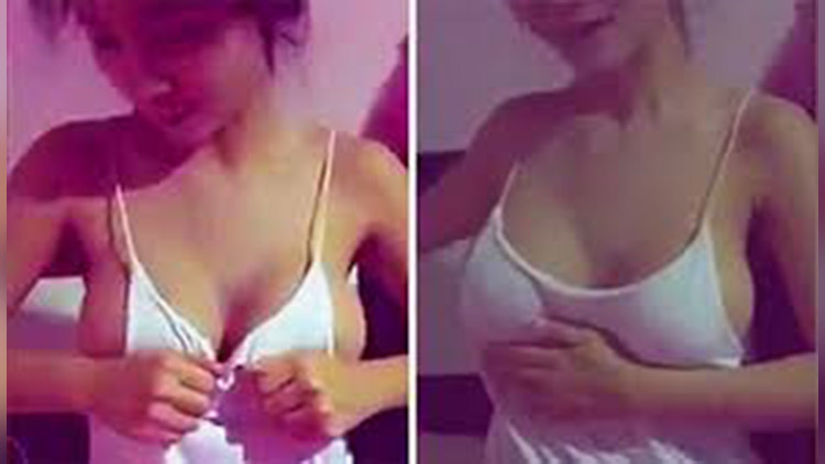 A Sexy Model Demonstrates On Cam How To Identify Fake Breasts