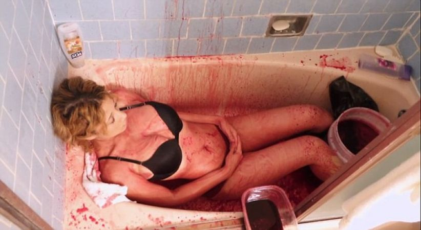 girl bathing with blood 