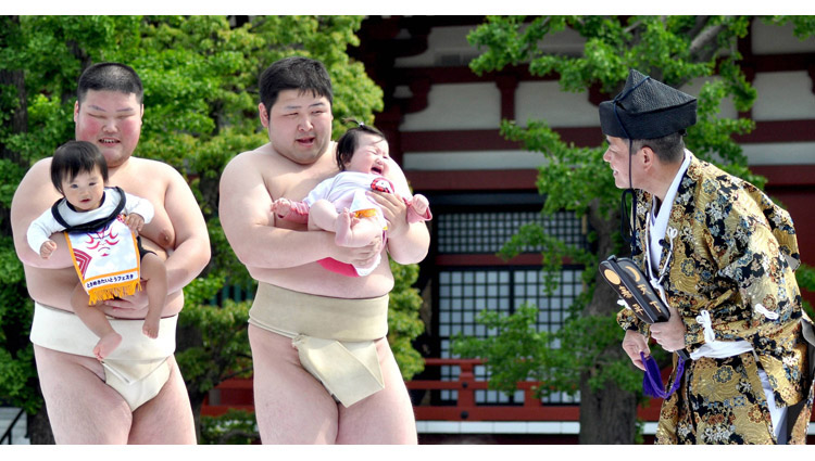 Crying sumo baby contest You have never seen anything like this