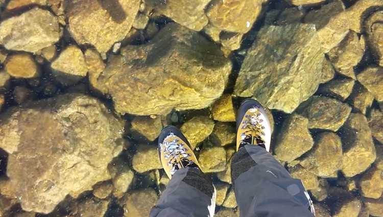 This is how Walking on a Frozen Lake with Extremely Clear Water Feels Like!